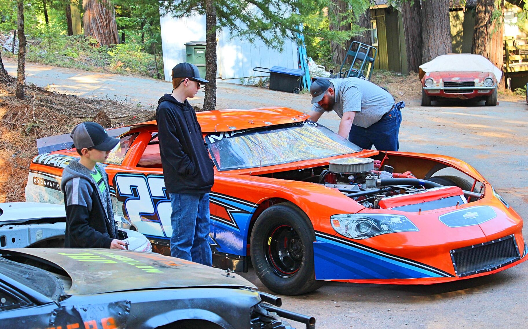 6. The five of the clan all helped build up the race car, ensuring the project was done properly and was safe and learning all about how vehicles and their many parts work, from the bottom to the top..jpg